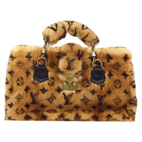 louis vuitton purse with accent faux fur black handle|Louis Vuitton counterfeit.